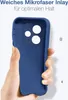A hand holding a blue phone case with a microfiber inlay. Produktbild-Vorschau