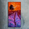 A rectangular canvas wall clock with a painting of a lavender field at sunset, mounted on a textured gray wall. Produktbild-Vorschau