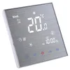 A digital thermostat with a brushed metal finish and a large LCD display. Náhled obrázku produktu