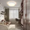 A modern bedroom with a desk, chair, bed, and wardrobe, featuring a ceiling light. Podgląd zdjęcia produktu