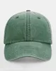 A green baseball cap is shown against a white background. Anteprima dell’immagine prodotto