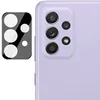 A close-up of a smartphone camera lens protector next to a smartphone. Produktbild-Vorschau