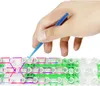 A hand is using a blue hook to manipulate colorful rubber bands on a loom board, demonstrating the process of making a bracelet. Náhľad obrázku produktu