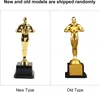 Two golden trophies are displayed side-by-side on a white background, labeled 'New Type' and 'Old Type'. Produktbild-Vorschau