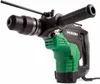 A professional studio shot of a green and black rotary hammer drill against a white background. Produktbild-Vorschau