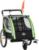 A green and black child trailer for bicycles, shown from the front-side angle. Produktbild-Vorschau
