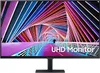 A Samsung UHD monitor is displayed front and center on a black stand, showcasing a vibrant, abstract image on its screen. Produktbild-Vorschau