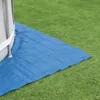 A blue tarp is laid out on green grass next to the base of a round pool. Produktbild-Vorschau