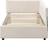 A close-up view of a beige upholstered bed frame with a slatted mattress support. Náhľad obrázku produktu