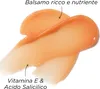 A swatch of orange-colored cream or balm is shown on a white background, with text labels pointing to different parts of the swatch. Anteprima dell’immagine prodotto