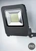A dark gray LED floodlight is mounted on a light gray wall. Produktbild-Vorschau