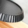 A close-up view of a fluted tart pan with a speckled granite-like finish. Produktbild-Vorschau
