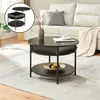 A round coffee table with a lift-top is shown in a living room setting, next to a sofa. Náhled obrázku produktu