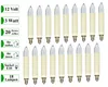 A collection of 18 candle-shaped light bulbs with cream-colored bases and clear glass tops, arranged in two rows on a white background. To the left of the bulbs are several green rectangular labels with white text and icons, indicating product specificatio Produktbild-Vorschau
