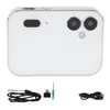A white digital camera with a triple lens system and accessories laid out below it on a white background. Podgląd zdjęcia produktu