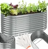A raised garden bed filled with various plants, along with gardening gloves and a metal frame. Náhled obrázku produktu