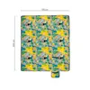 A flat lay of a picnic blanket with a tropical pattern, showing dimensions. Produktbild-Vorschau