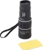 A black monocular telescope with a wrist strap and a yellow cleaning cloth on a white background. Voir les images du produit