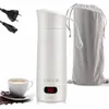A white electric kettle with a digital display, along with power cords, a carrying pouch, and a cup of coffee with coffee beans. Produktbild-Vorschau