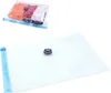 A vacuum seal bag with a valve, and a smaller vacuum seal bag containing clothes. Anteprima dell’immagine prodotto