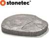 A concrete stepping stone designed to look like a tree stump slice, with visible wood grain and cracks. Anteprima dell’immagine prodotto