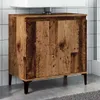 A wooden vanity cabinet with a sink on top, set against a tiled wall. Náhled obrázku produktu