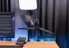 A desk setup with a teleprompter, camera, monitor, and lighting. Náhľad obrázku produktu