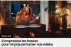 A man is relaxing on a couch watching a TV, with a soundbar placed below the TV. Voir les images du produit