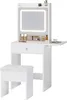 A white vanity table with a lighted mirror and a stool, set against a white background. Voir les images du produit