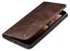 A brown leather flip case for a smartphone is shown from a diagonal angle, with the front cover open. Produktbild-Vorschau