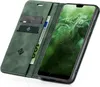 A green flip case for a smartphone, open to reveal credit card slots and a banknote. The smartphone screen is visible. Produktbild-Vorschau