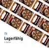 Multiple packages of hearing aid batteries are arranged diagonally on a white background. Produktbild-Vorschau