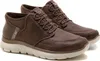 A pair of brown Skechers slip-on winter boots with beige soles, shown against a white background. Náhled obrázku produktu