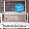 A wooden animal hutch with a wire mesh top and front, set against a brick wall. Produktbild-Vorschau
