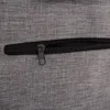 A close-up view of a zipper on a gray fabric. Produktbild-Vorschau