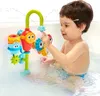 A young child is playing with a bath toy in a bathtub. Podgląd zdjęcia produktu