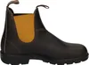 A side view of a brown leather Blundstone boot with mustard yellow elastic side panels. Voir les images du produit