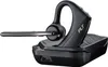 A black headset with a charging base, isolated on a white background. Produktbild-Vorschau