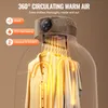 A portable clothes dryer with clothes hanging inside, showing airflow. Voir les images du produit