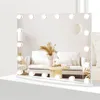 A Hollywood-style makeup mirror with lights, reflecting a living room scene. Voir les images du produit