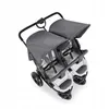 A top-down view of a gray and silver double stroller against a white background. Produktbild-Vorschau