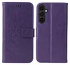 A purple flip case for a smartphone is shown open, displaying the inside and outside of the case. Produktbild-Vorschau