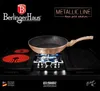 A rose gold frying pan is shown on a stovetop with glowing electric burners. Náhľad obrázku produktu
