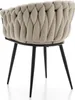 A rear view of a beige upholstered chair with a braided back and black legs, isolated on a white background. Podgląd zdjęcia produktu