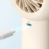 Close-up shot of a USB-C cable being plugged into a beige fan. Anteprima dell’immagine prodotto