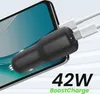 A black car charger plugged into a smartphone, with text indicating its power output. Anteprima dell’immagine prodotto