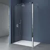 A modern shower enclosure with a walk-in design and a side panel, set against a dark blue wall and a gray floor. Produktbild-Vorschau