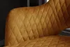 Close-up of the quilted upholstery of a mustard yellow bar stool. Produktbild-Vorschau