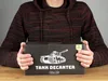 A person is holding a product box with a tank design on it. Podgląd zdjęcia produktu