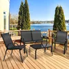 A patio set on a wooden deck overlooking a body of water. Náhľad obrázku produktu